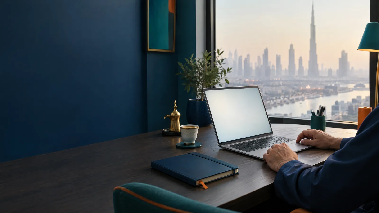 Illustrative image: restaurant owner at a desk in morning light with a laptop and a cup of coffee