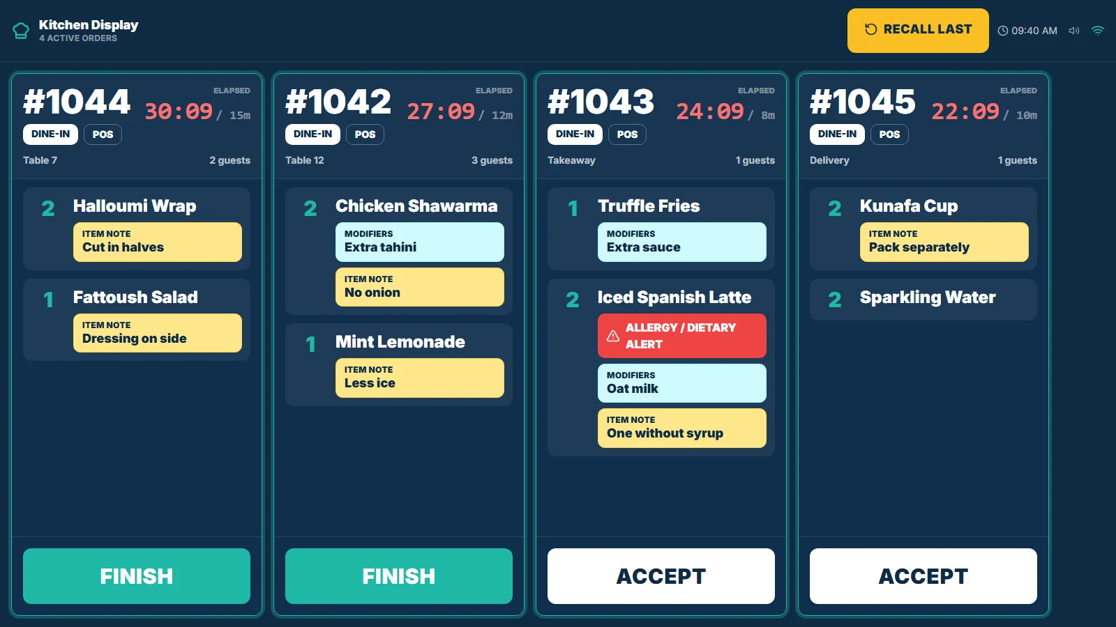 TajerGo kitchen display showing active order tickets and preparation status