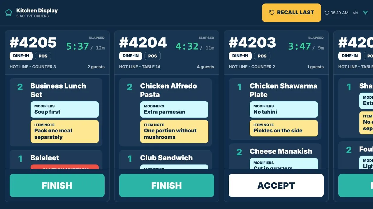 TajerGo kitchen display for a hot line with counter and table tickets, modifiers and item notes