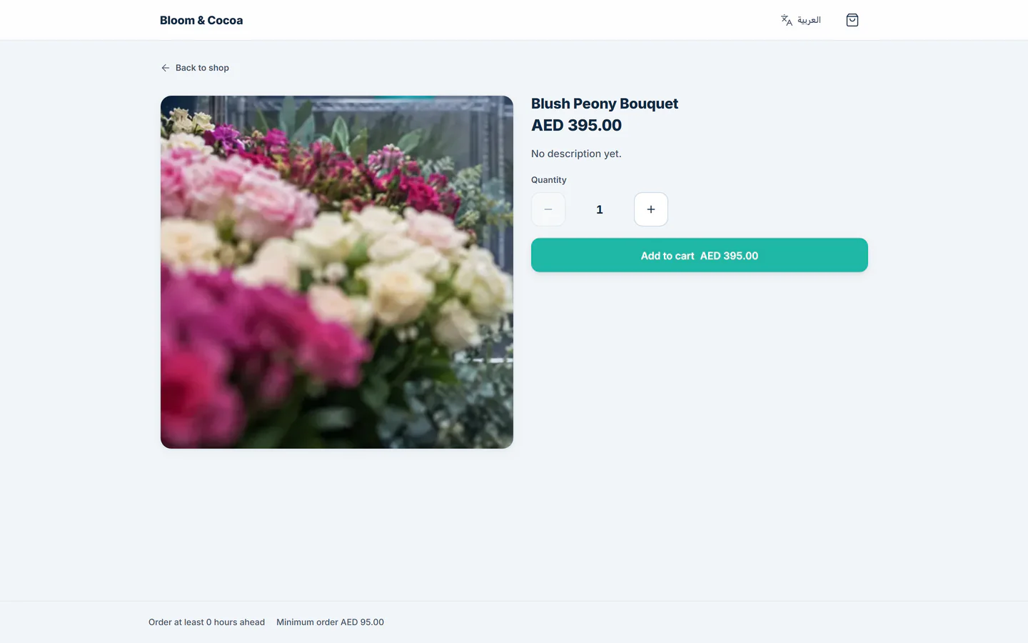 TajerGo customer online shop product page for a bouquet with price and add to cart, Bloom & Cocoa Flowers demo tenant